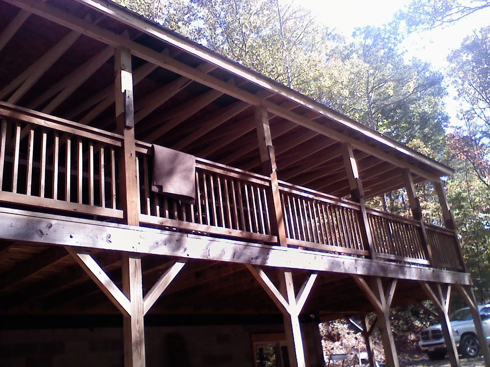 Timber framing under a new elevated porch and deck — Roof Leak Repair in Bloomfield Hills by Roofing Brothers